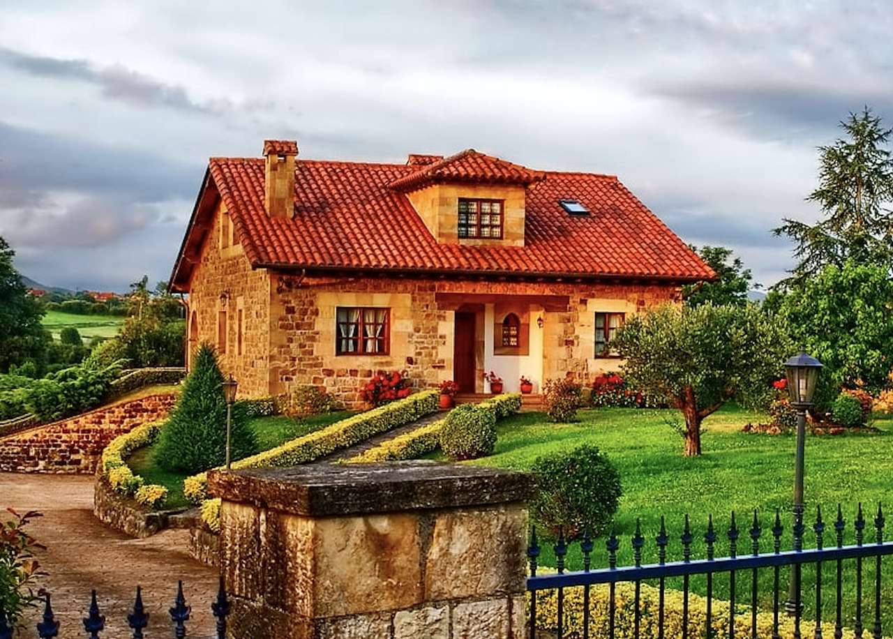 Pequena casa de campo inglesa com um belo jardim puzzle online