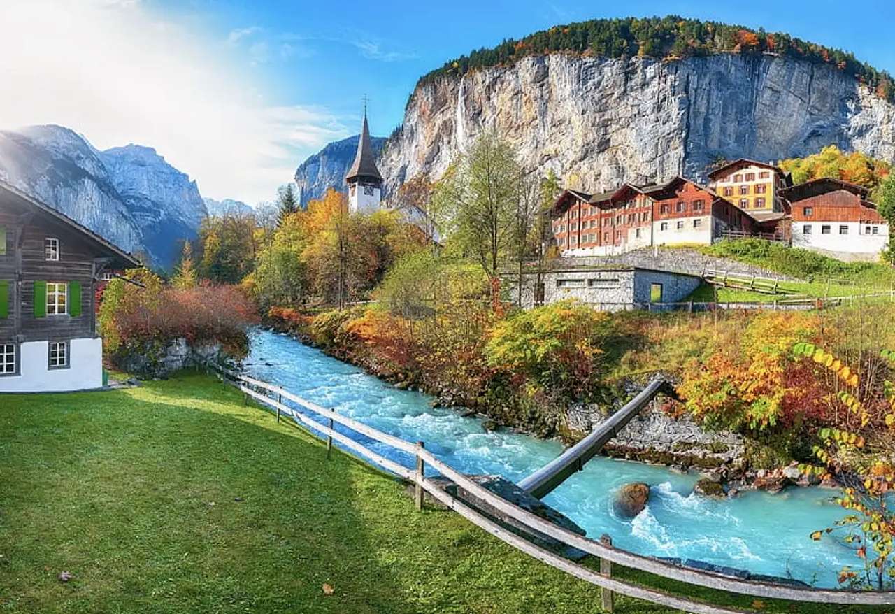 Schweiz - Ein atemberaubender Blick auf eine kleine Stadt Online-Puzzle