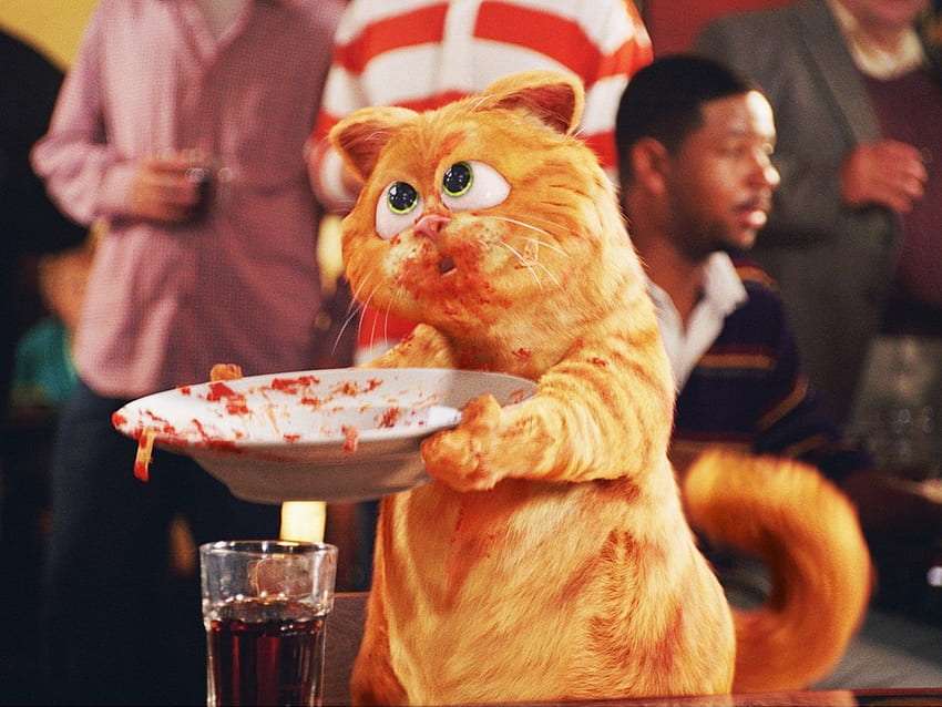 Garfield a mâncat și ar dori mai mult :) puzzle online