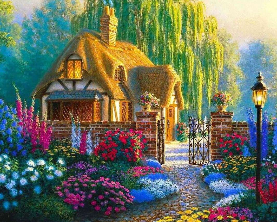 Een huis met een rieten dak. Een pand in bloemen legpuzzel online