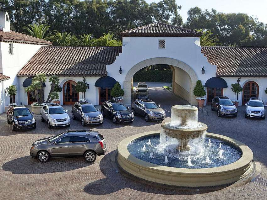 Santa Bárbara - un estacionamiento con una fuente en la plaza del pueblo rompecabezas en línea