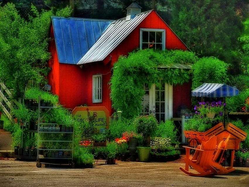 Uma casa vermelha entre uma vegetação luxuriante, um milagre puzzle online