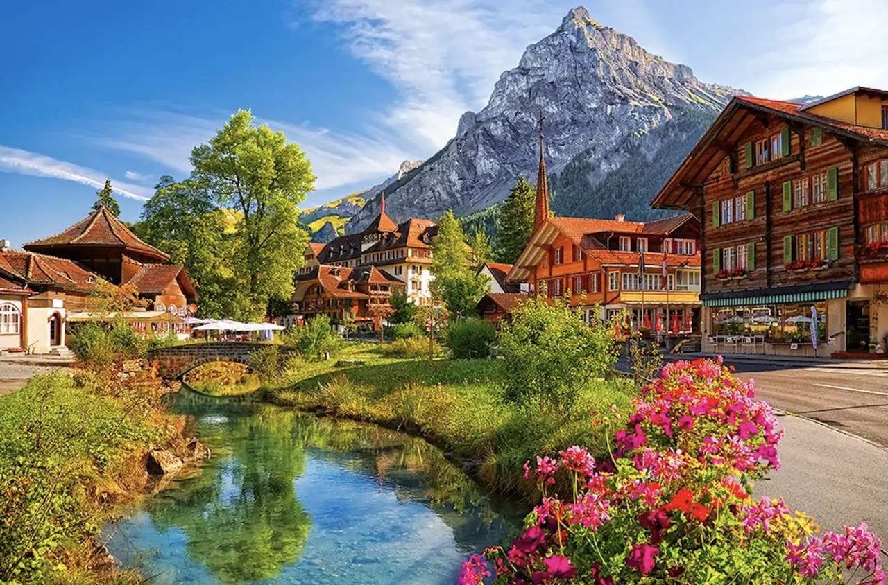 Svájc - falu a hegyek lábánál, mesebeli táj kirakós online