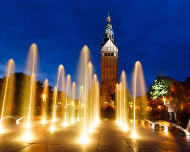 Fontäner i Krakow på kvällen Pussel online