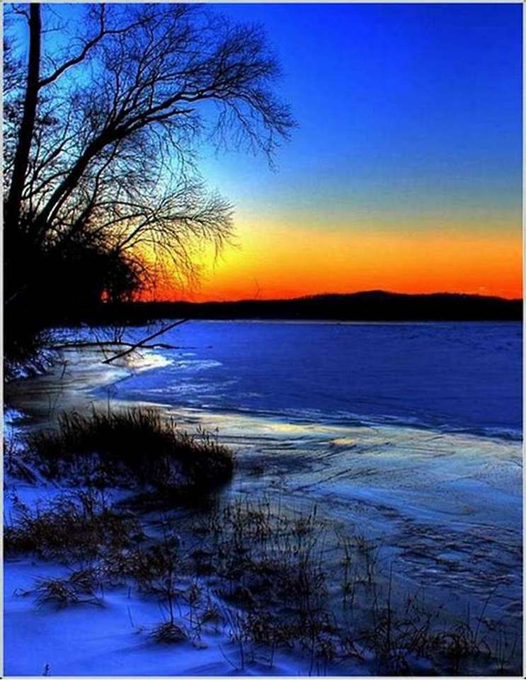 Захід сонця на озері пазл онлайн