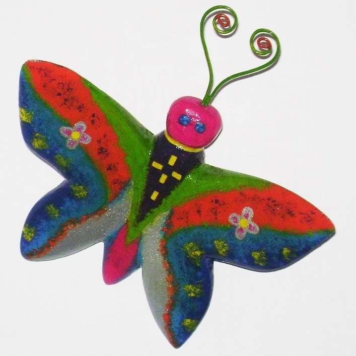 fluture sculptat în lemn puzzle online