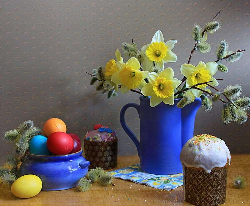 Daffodils, fairy tales like mini cats, Easter eggs, a cupcake jigsaw puzzle online