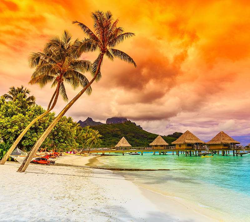 Sunset behind the clouds in the tropics, what a sight jigsaw puzzle online