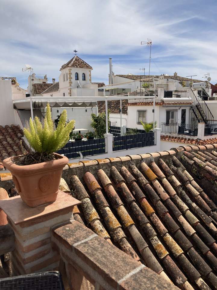 Au-dessus des toits de Marbella puzzle en ligne
