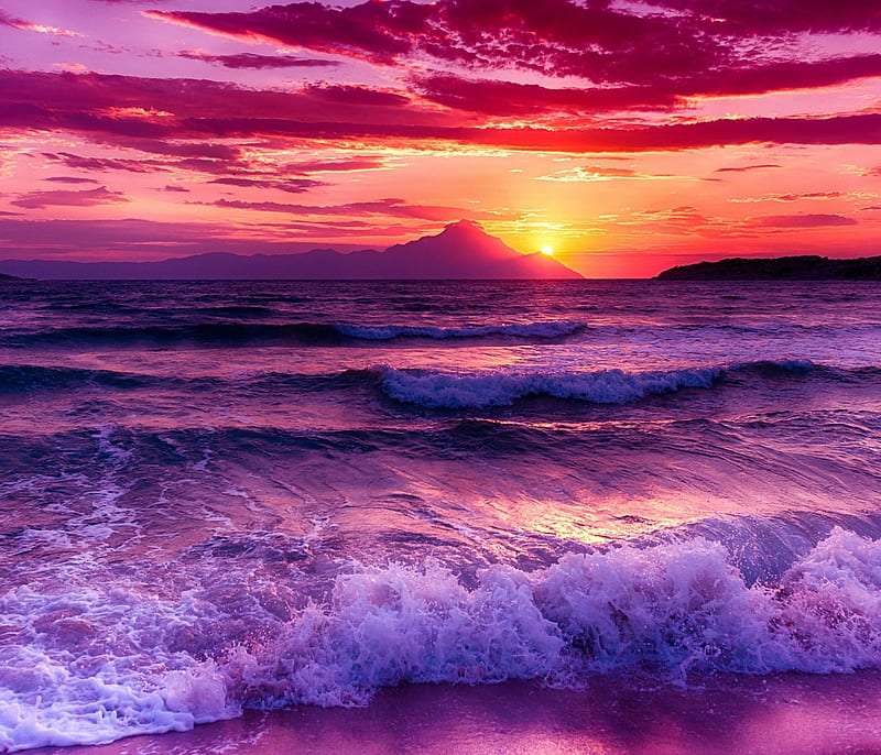 La belleza del cielo, la puesta del sol, el océano tormentoso. rompecabezas en línea
