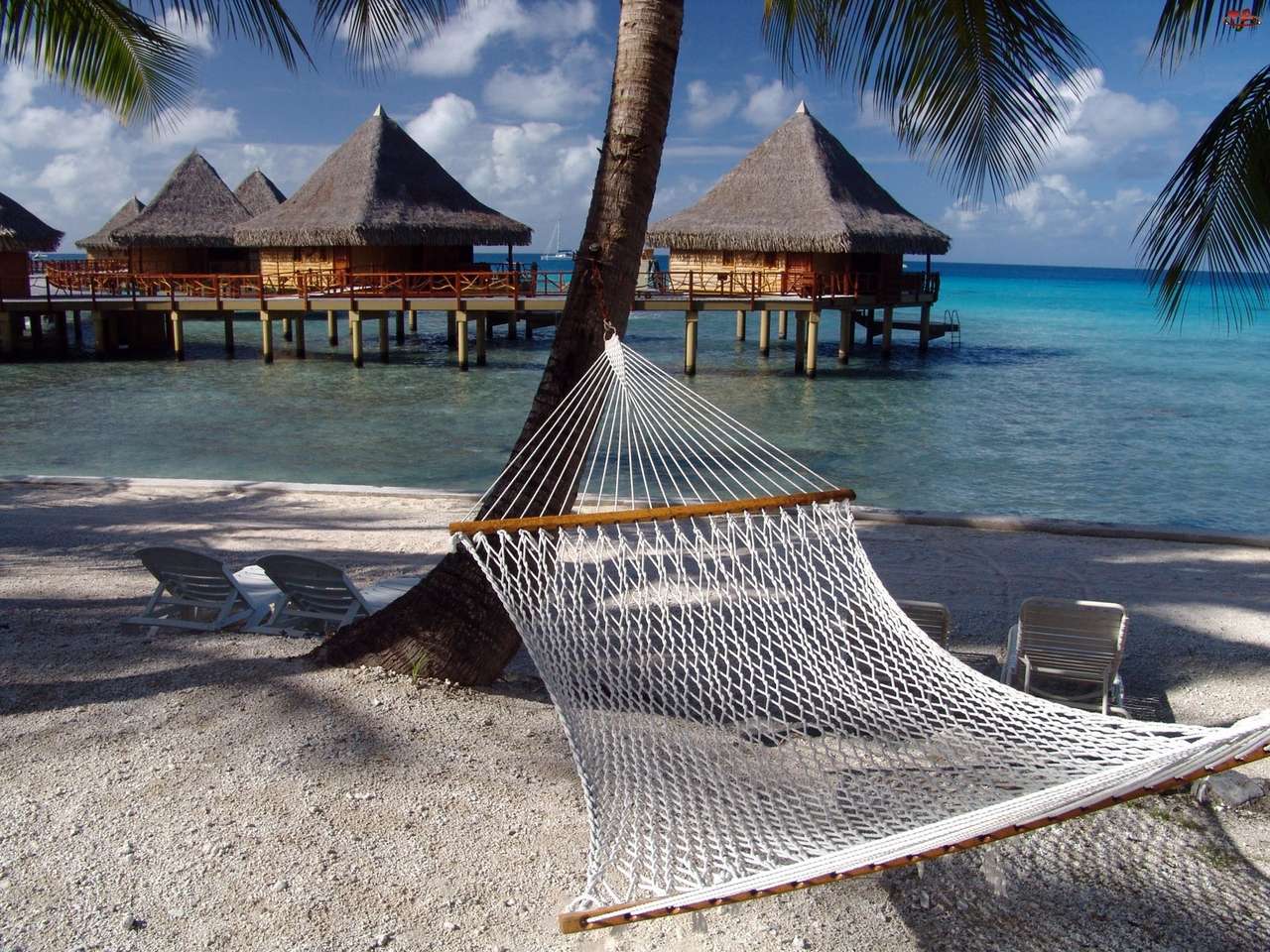 Hangmat op het strand in de tropen online puzzel