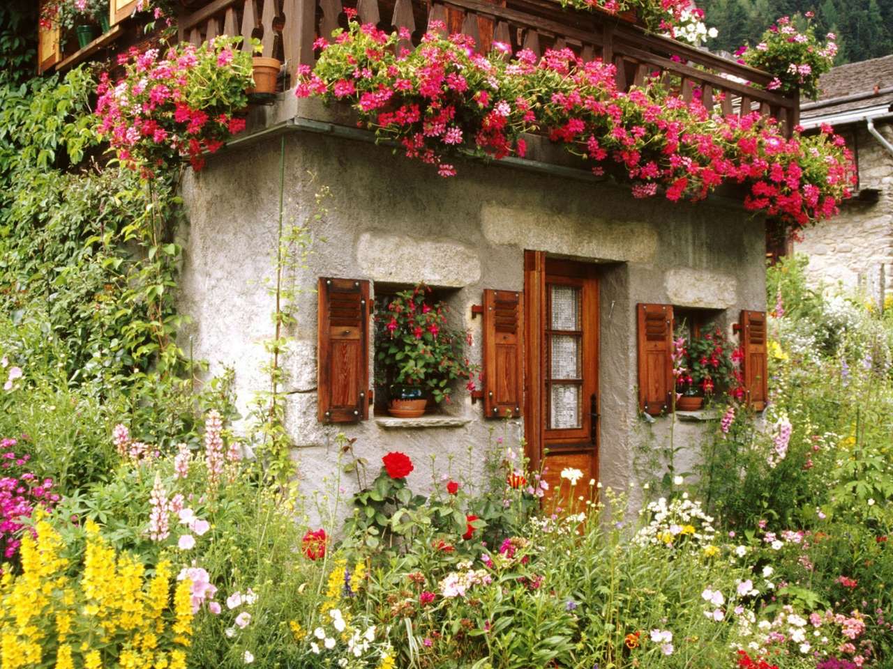 Una casa de flores entre flores, algo hermoso rompecabezas en línea
