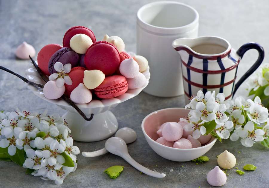 Delicious macaroons, meringues and cherry blossoms jigsaw puzzle online