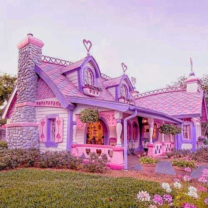 Ett fantastiskt rosa hus pussel på nätet