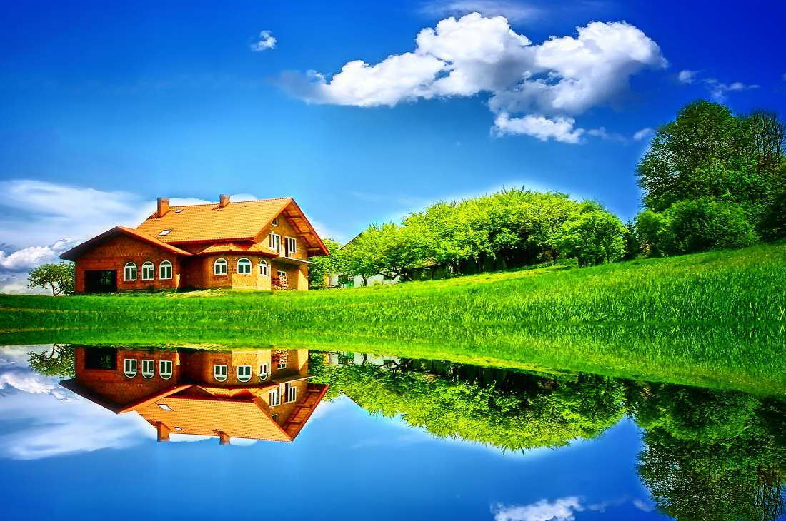 Le beau paysage de la maison dans le pré au bord du lac, un miracle puzzle en ligne