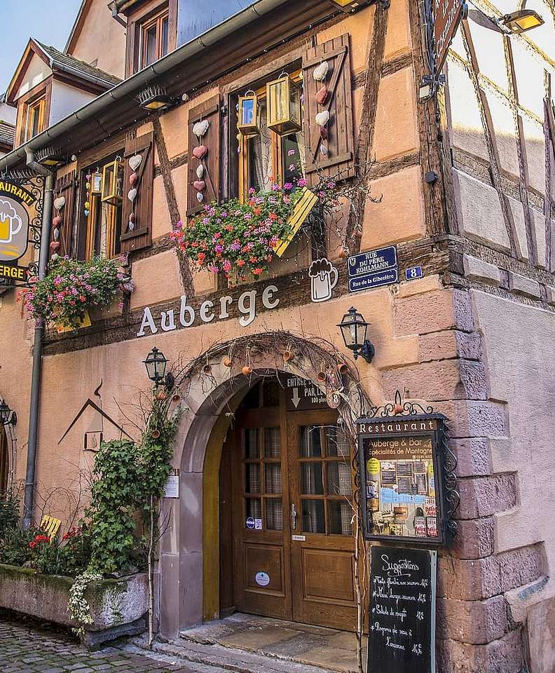 Den fantastiska fasaden på en Alsace-restaurang pussel på nätet