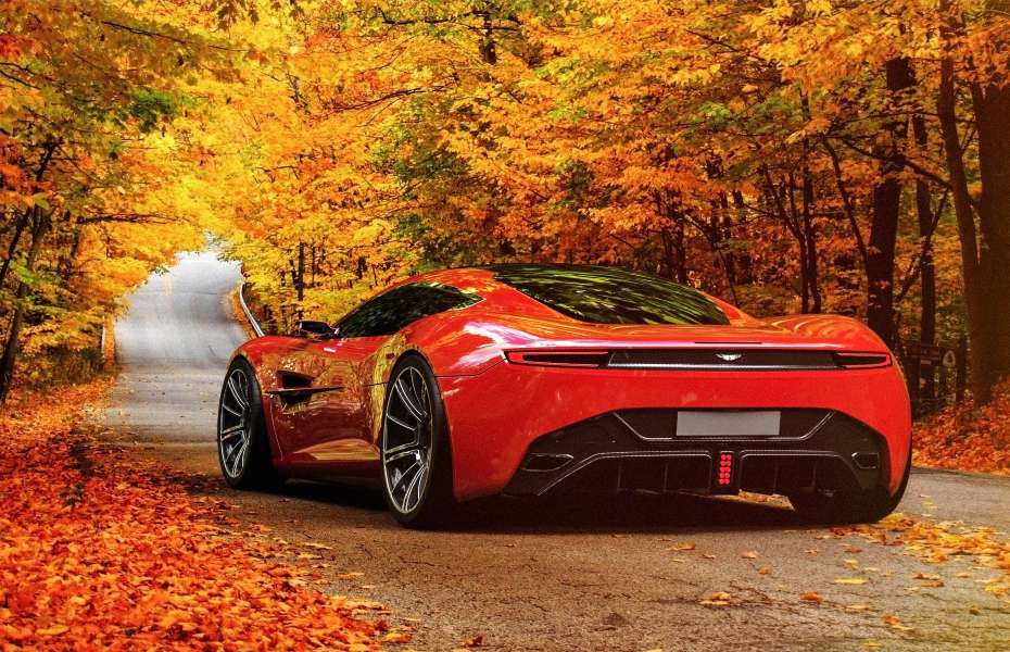 Розкішний автомобіль Aston Martin в осінньому вбранні онлайн пазл