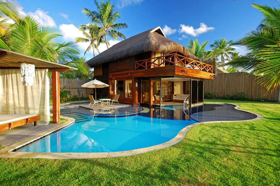 Uma casa de veraneio com piscina em um lugar de conto de fadas puzzle online