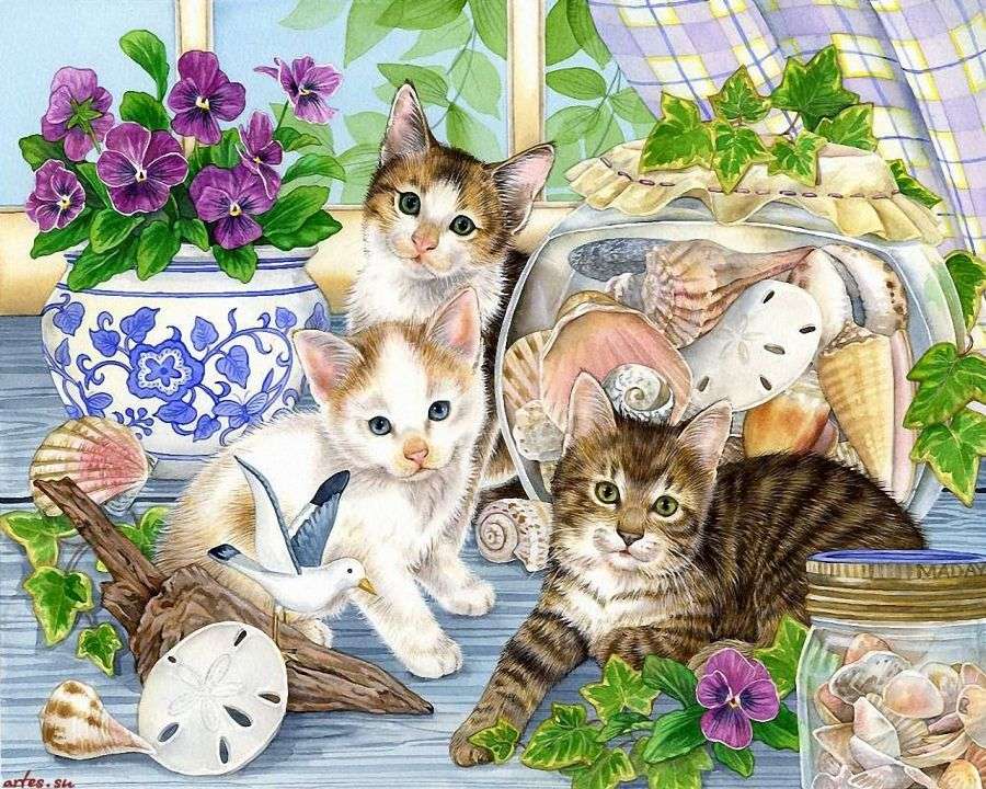 Kittens on the table jigsaw puzzle online