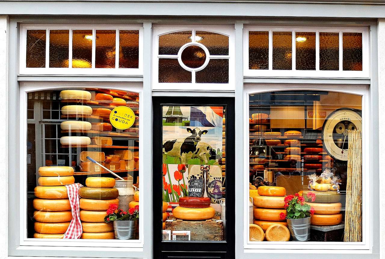 Local cheeses - production and sale (Gouda, Netherlands) jigsaw puzzle online