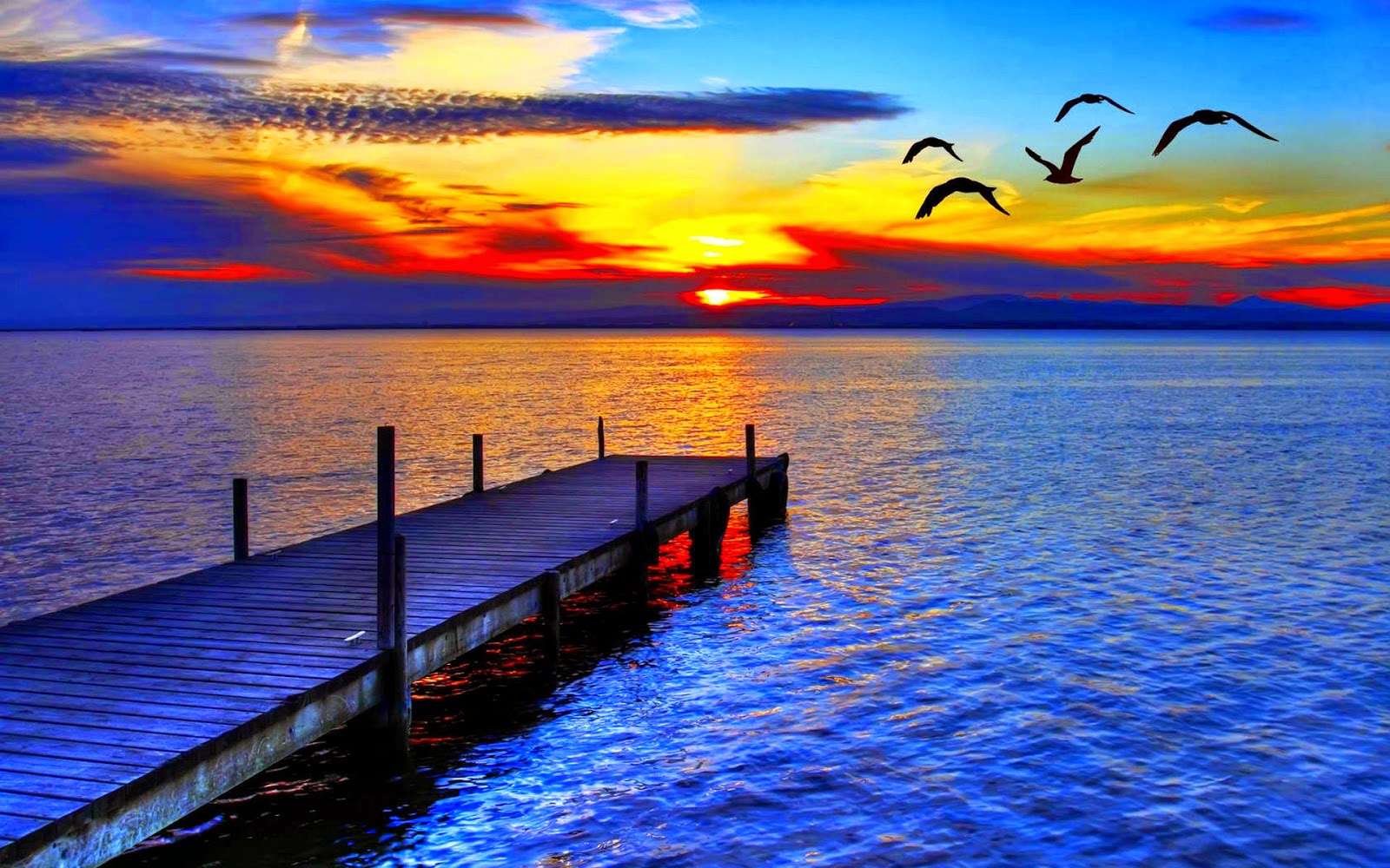 móló a tó és a naplemente felett kirakós online