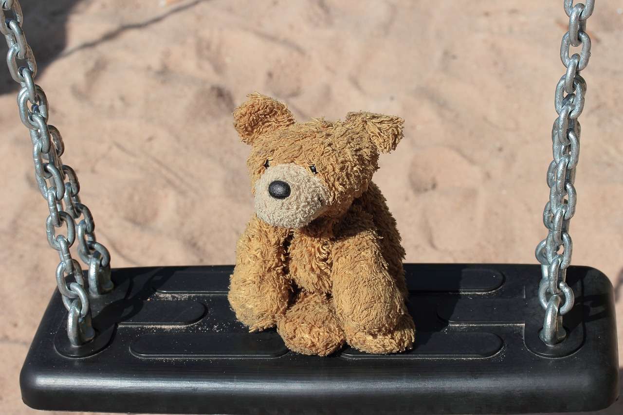 Teddy bear on a swing jigsaw puzzle online