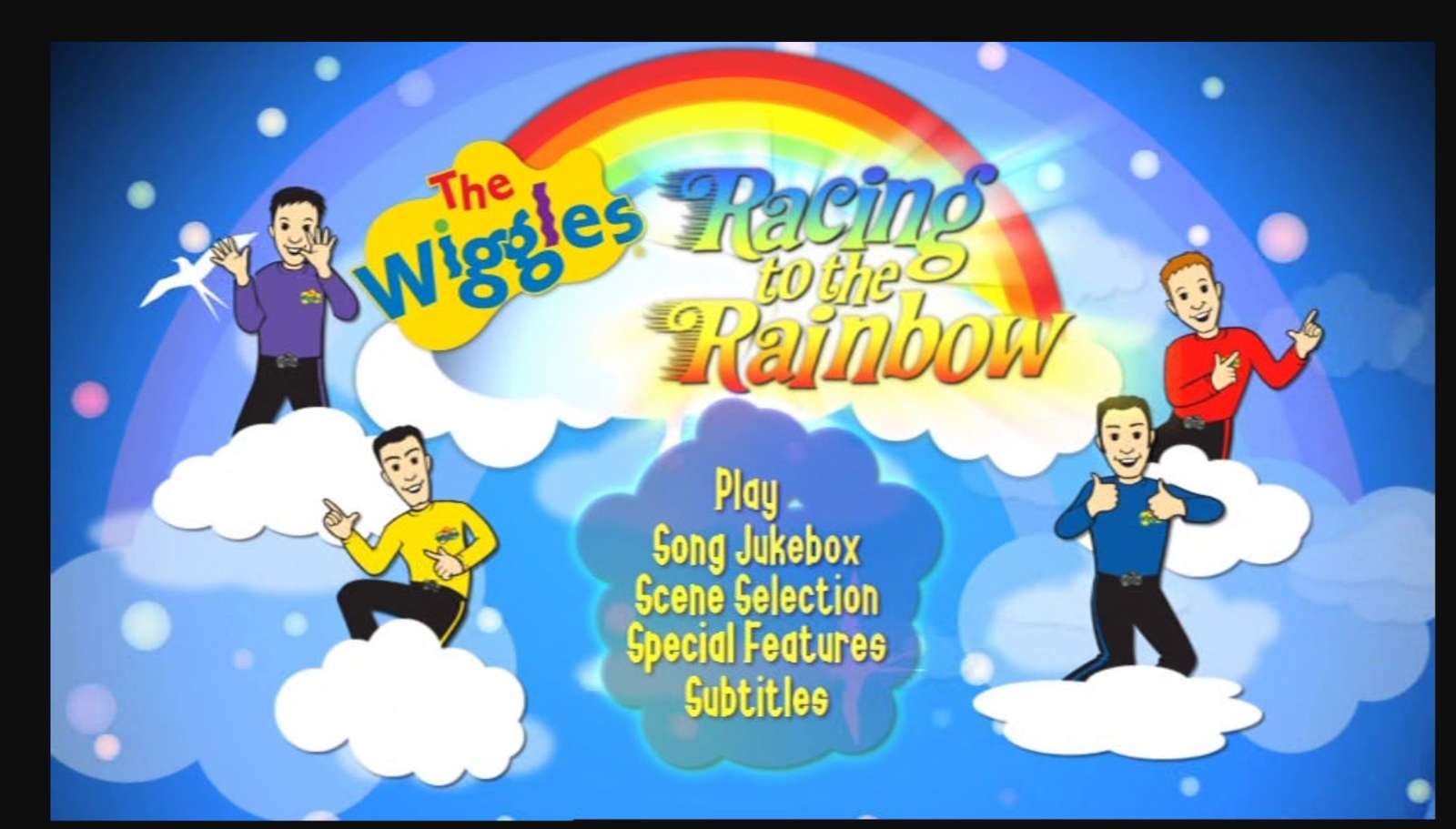 Racen naar het dvd-menu van Rainbow 2006 Wiggles legpuzzel online