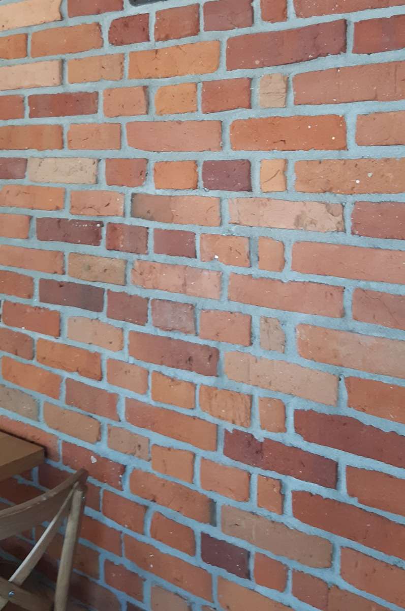 pared de ladrillos para colocar rompecabezas en línea