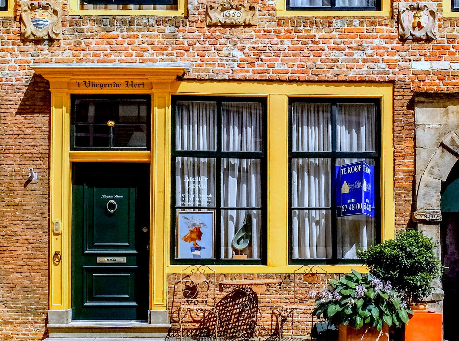 Fassade eines Hauses aus dem 17. Jahrhundert in Middelburg (Niederlande) Puzzlespiel online