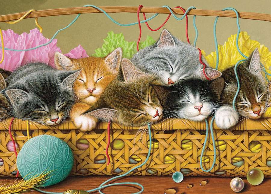 Gatitos durmiendo en una canasta con lana. rompecabezas en línea