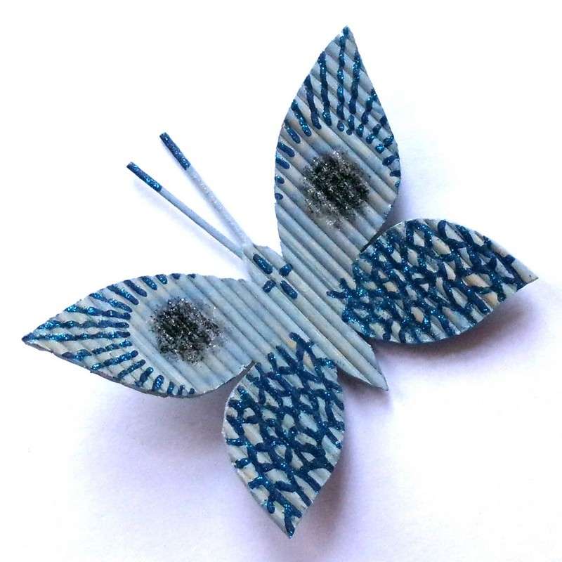fjäril byggd med pinnar pussel på nätet