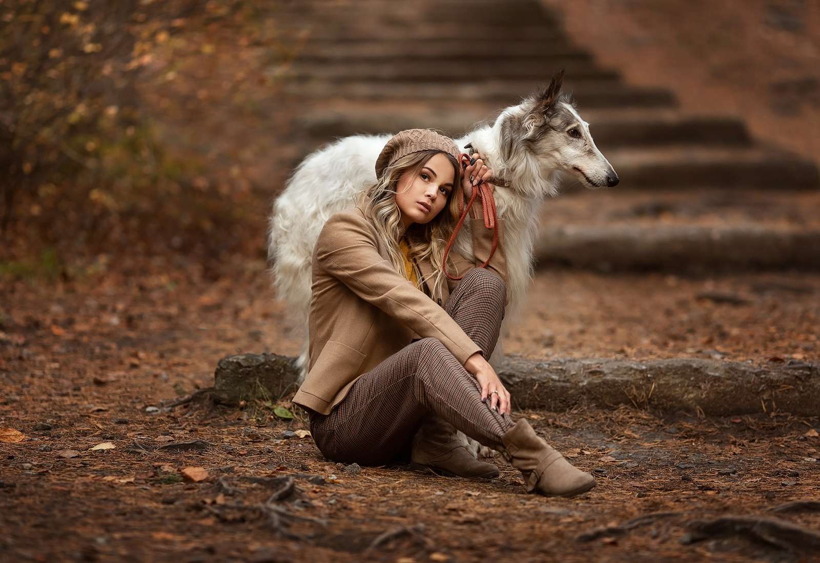 Femme avec un chien lévrier russe puzzle en ligne