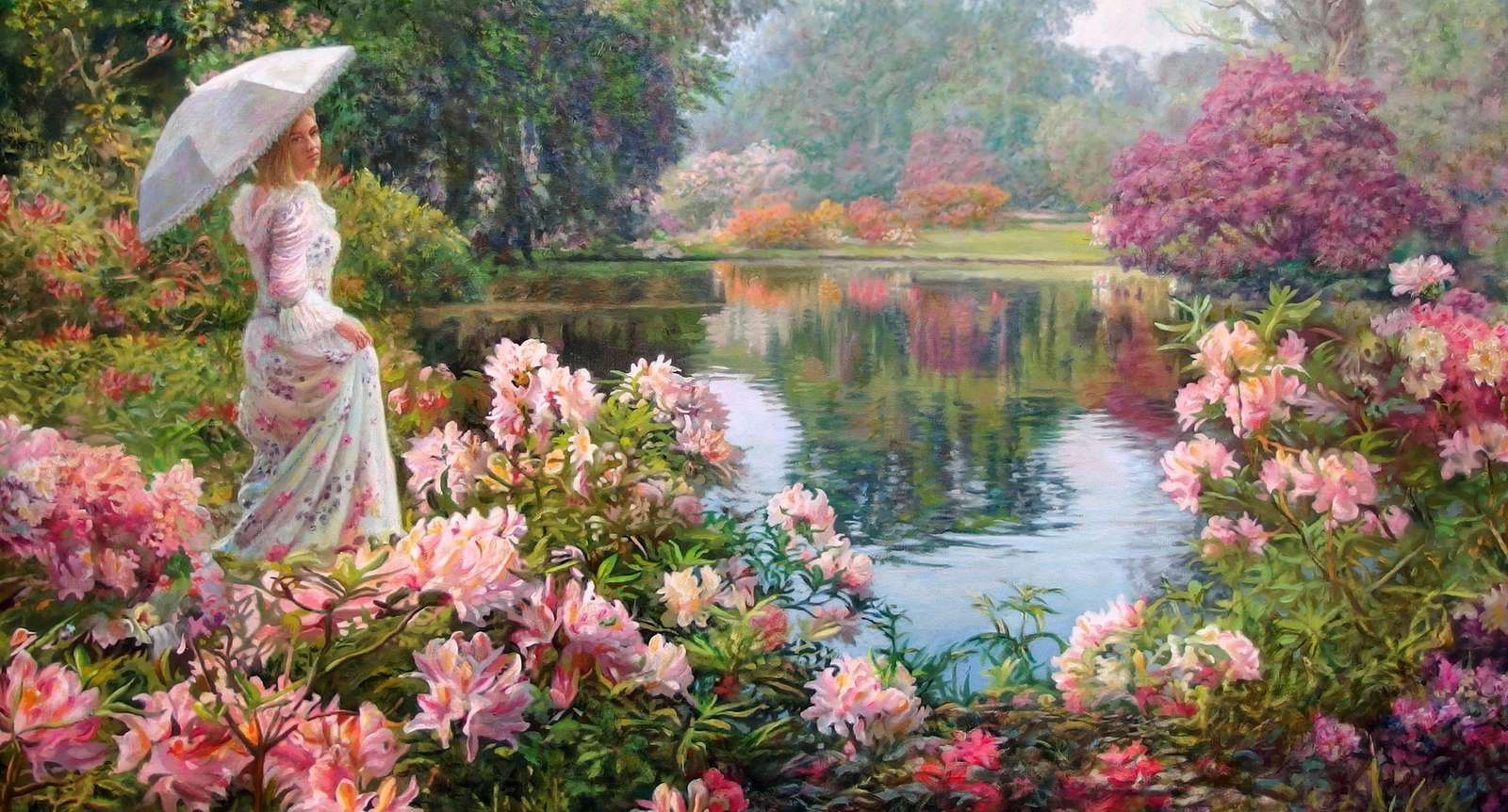 Μια γυναίκα σε έναν παράδεισο λουλουδιών δίπλα σε ένα ποτάμι παζλ online