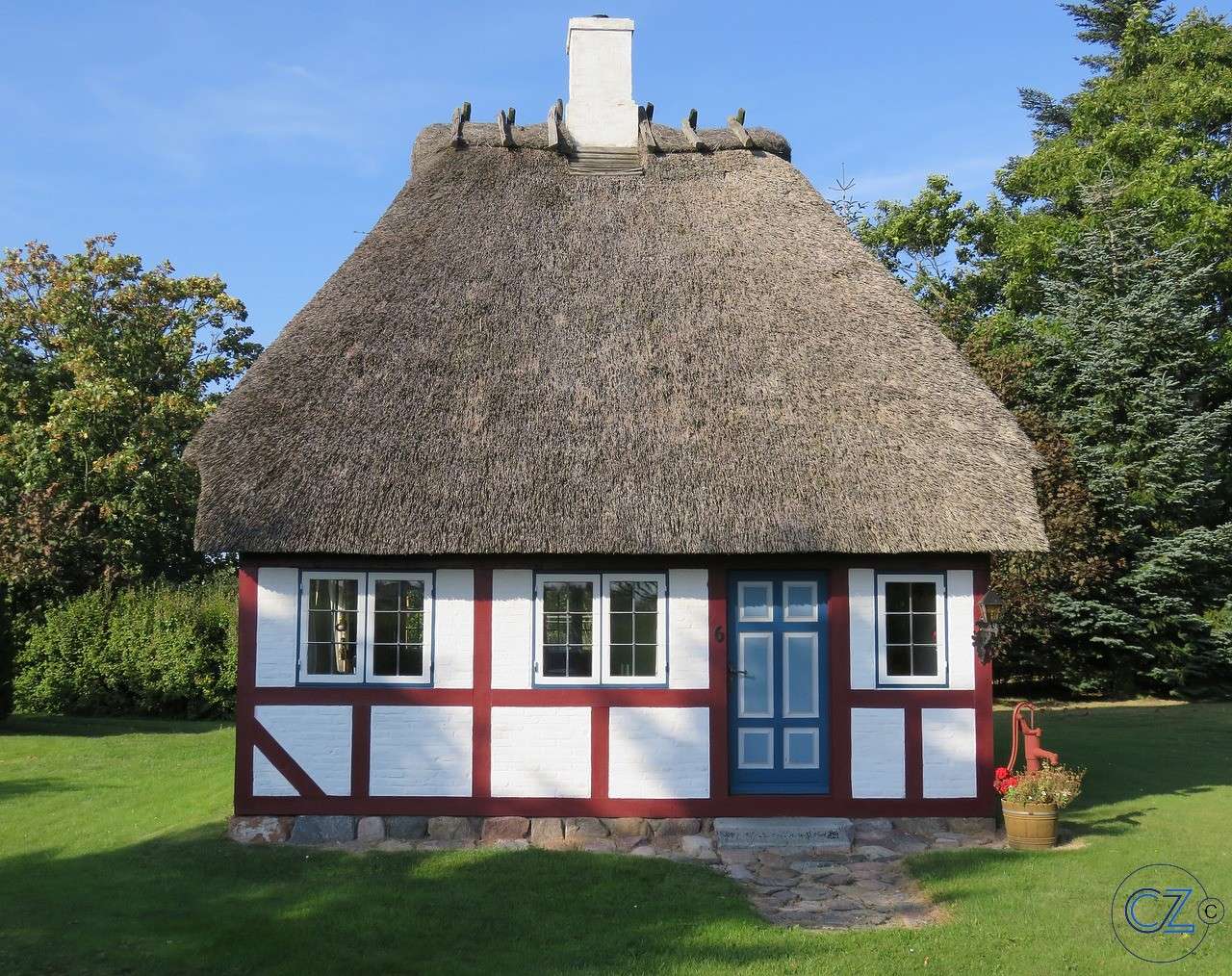 Δανία, Μικρό σπίτι με μισό ξύλο παζλ online