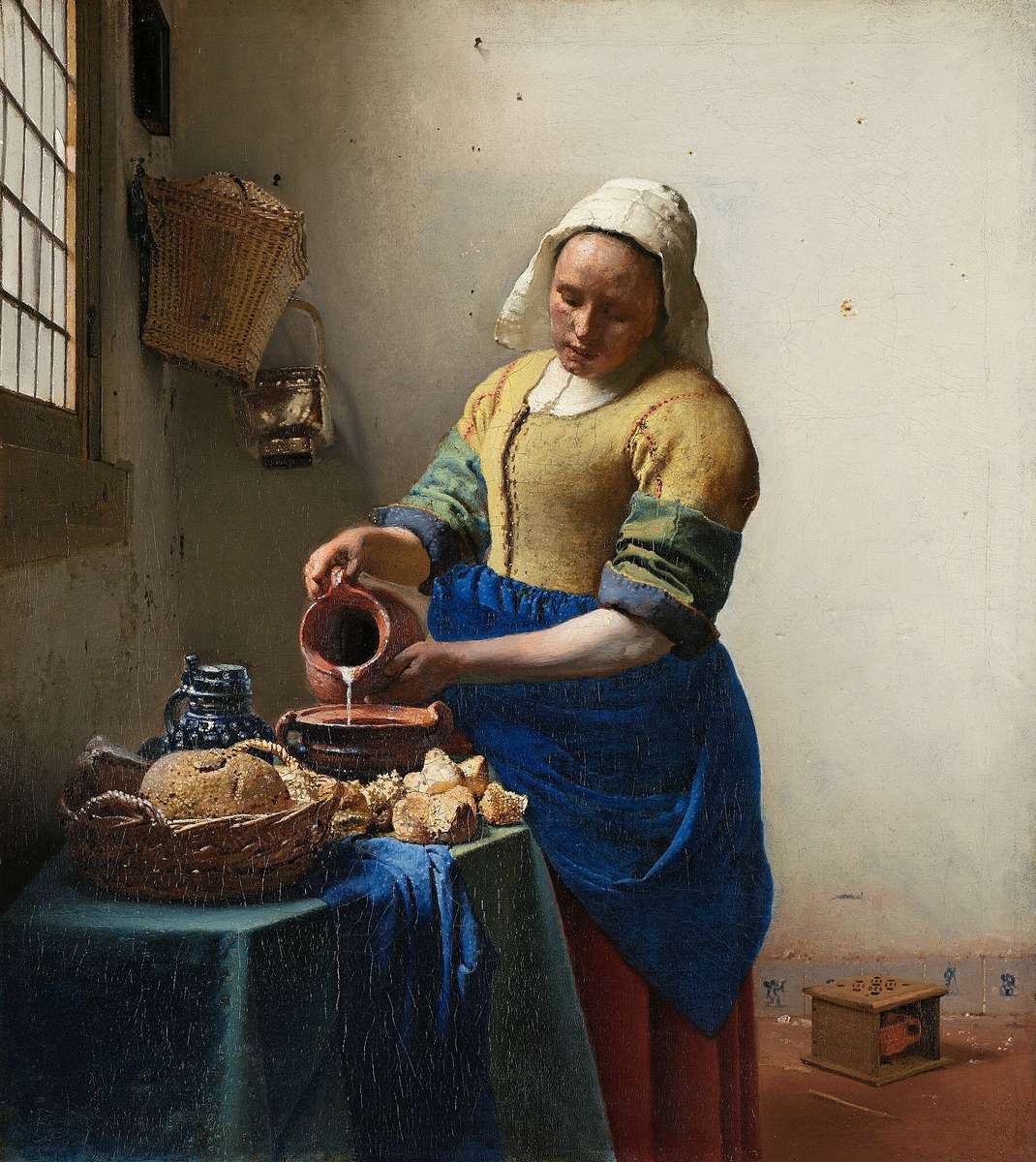 Vermeer tejforgó kirakós online