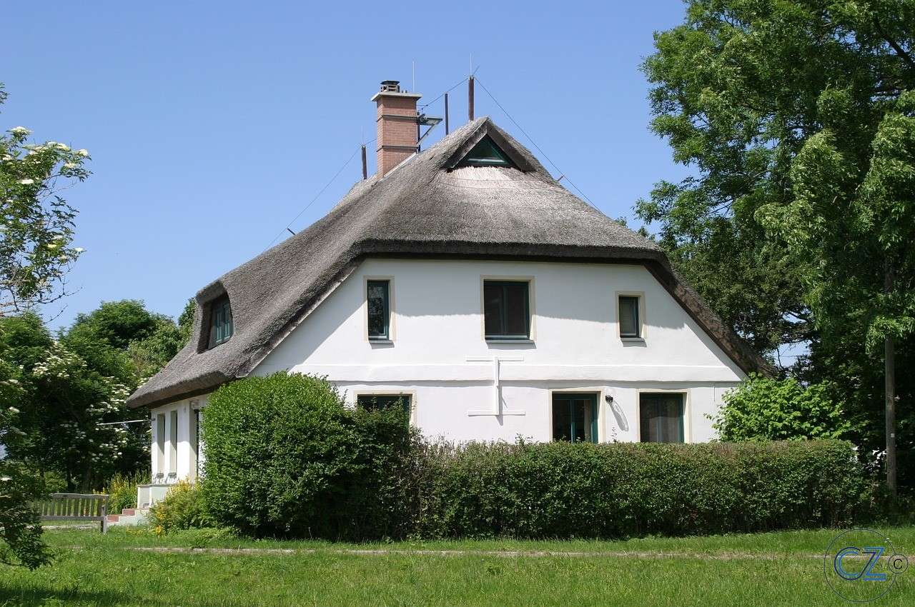 Villa com telhado de palha puzzle online