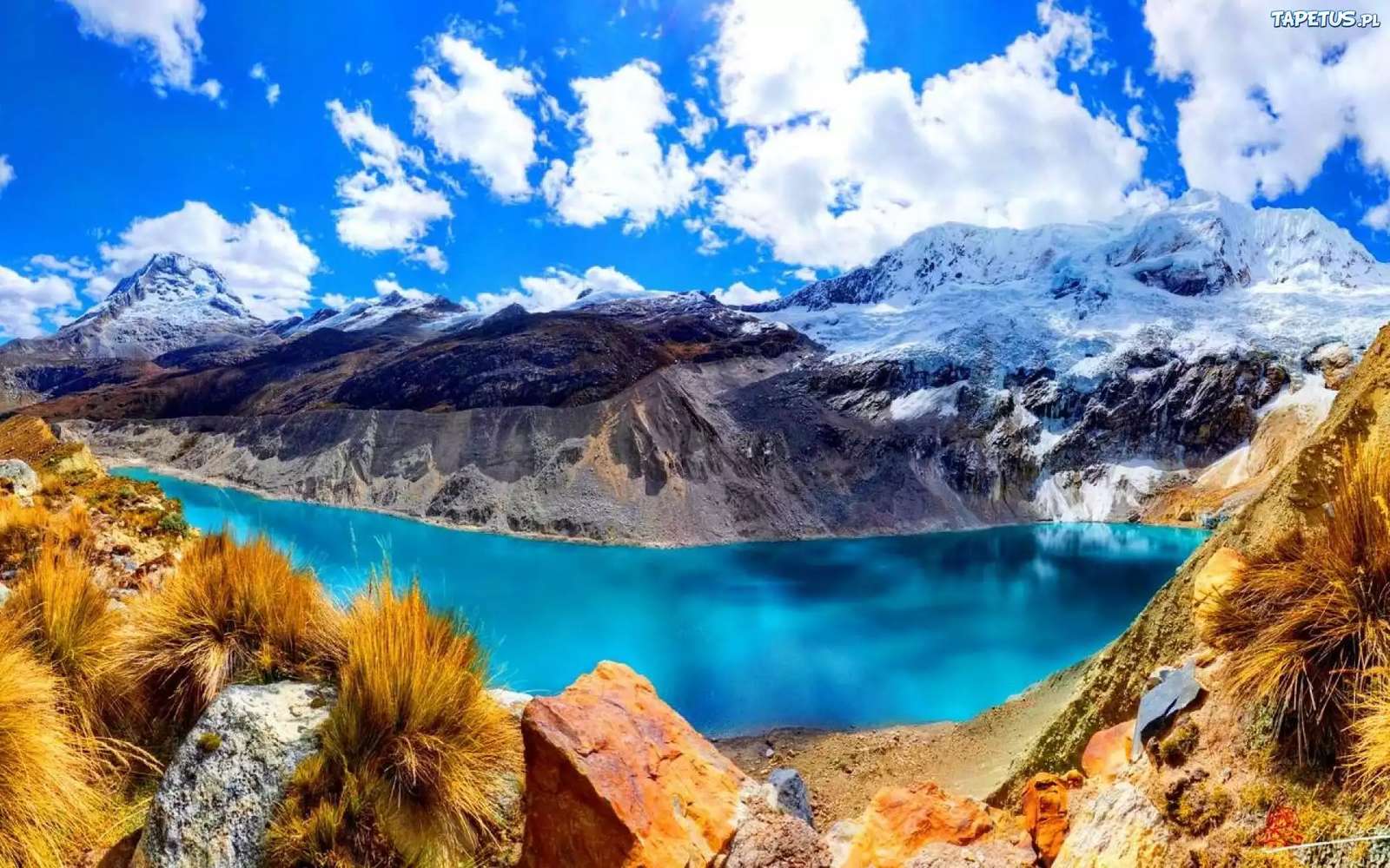 Um lago nas montanhas quebra-cabeças online