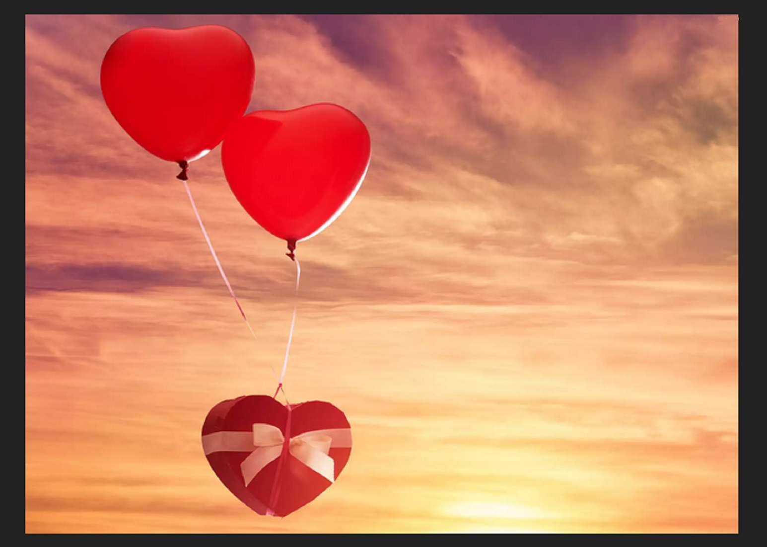 два красных шарика в форме сердечек онлайн-пазл