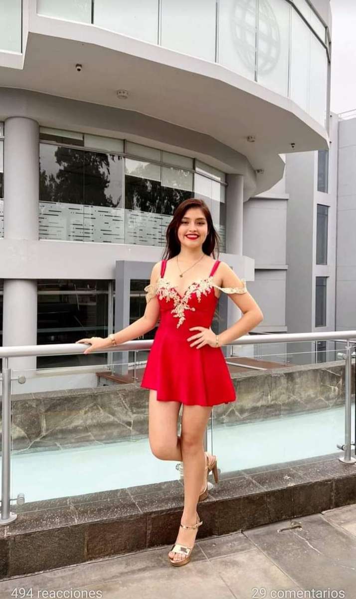 Bellissima con un vestito rosso puzzle online