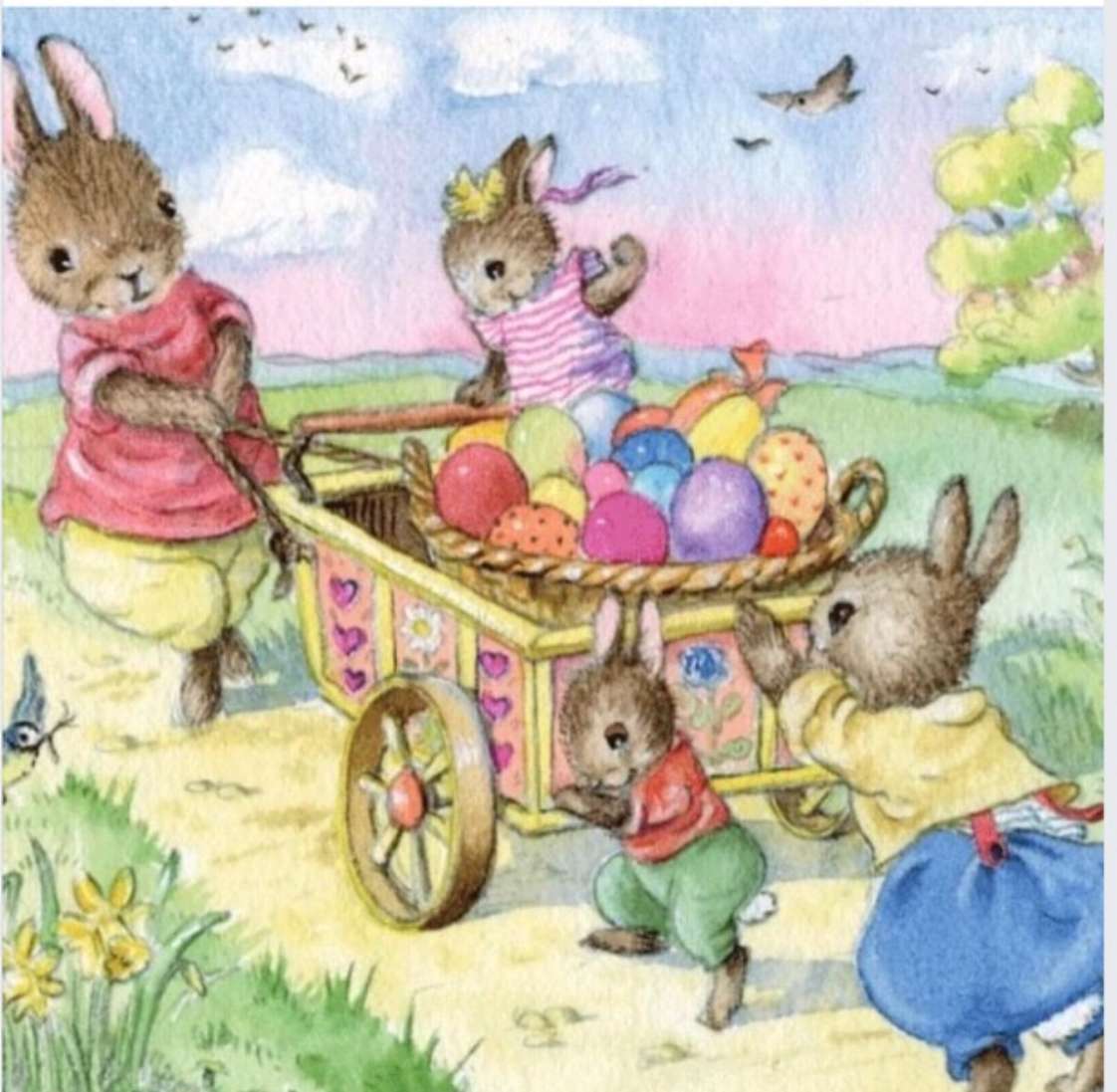 Velikonoční zajíčci tlačí vozík plný vajíček. online puzzle