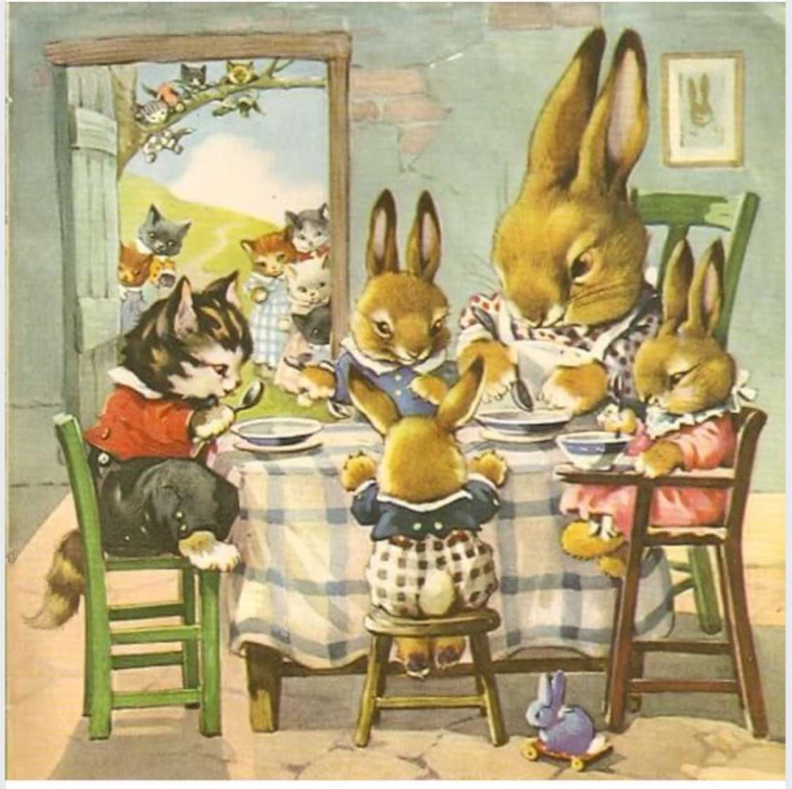 Kaniner har en gäst vid sitt bord. Pussel online
