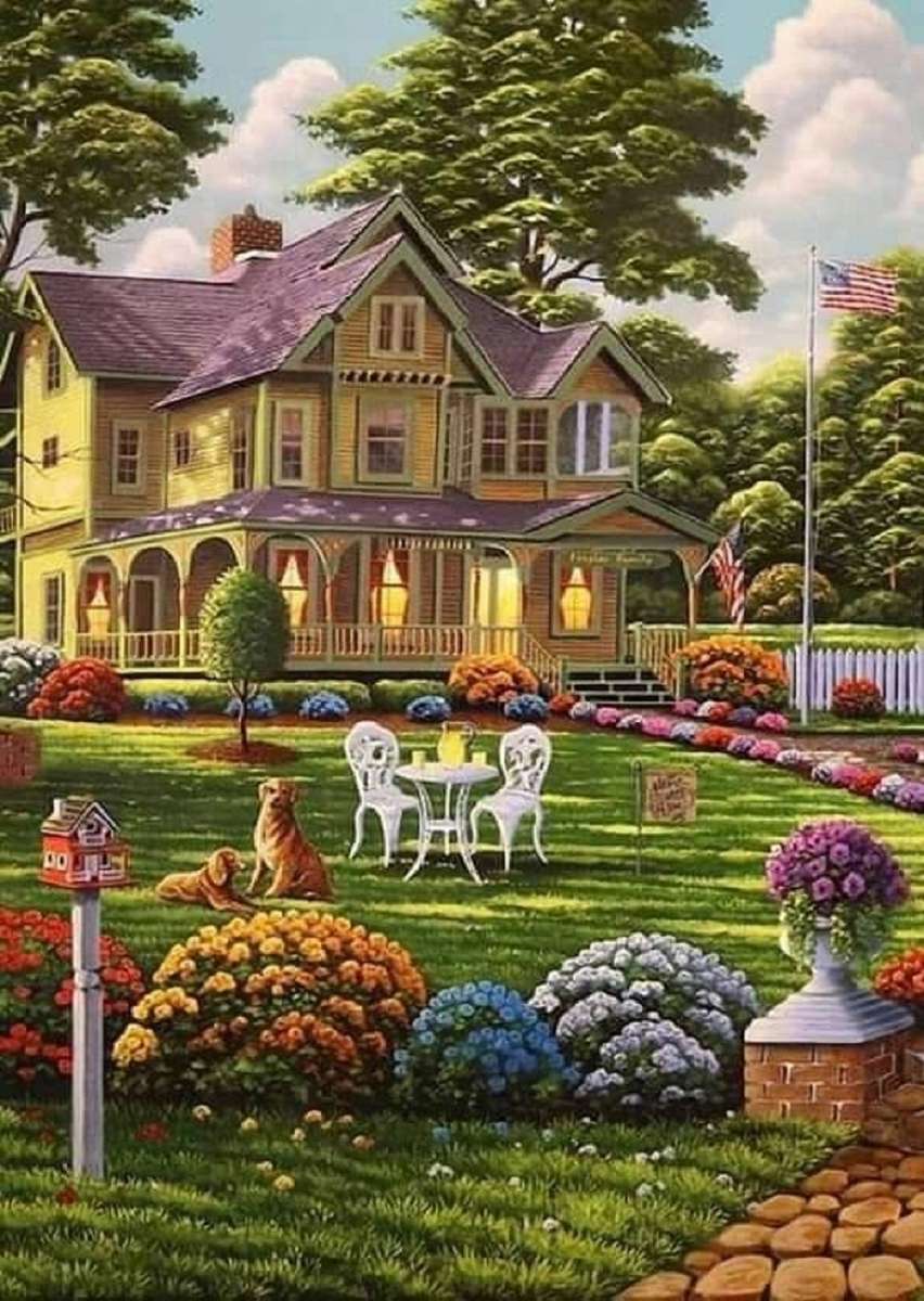 Uma grande mansão e um lindo jardim puzzle online