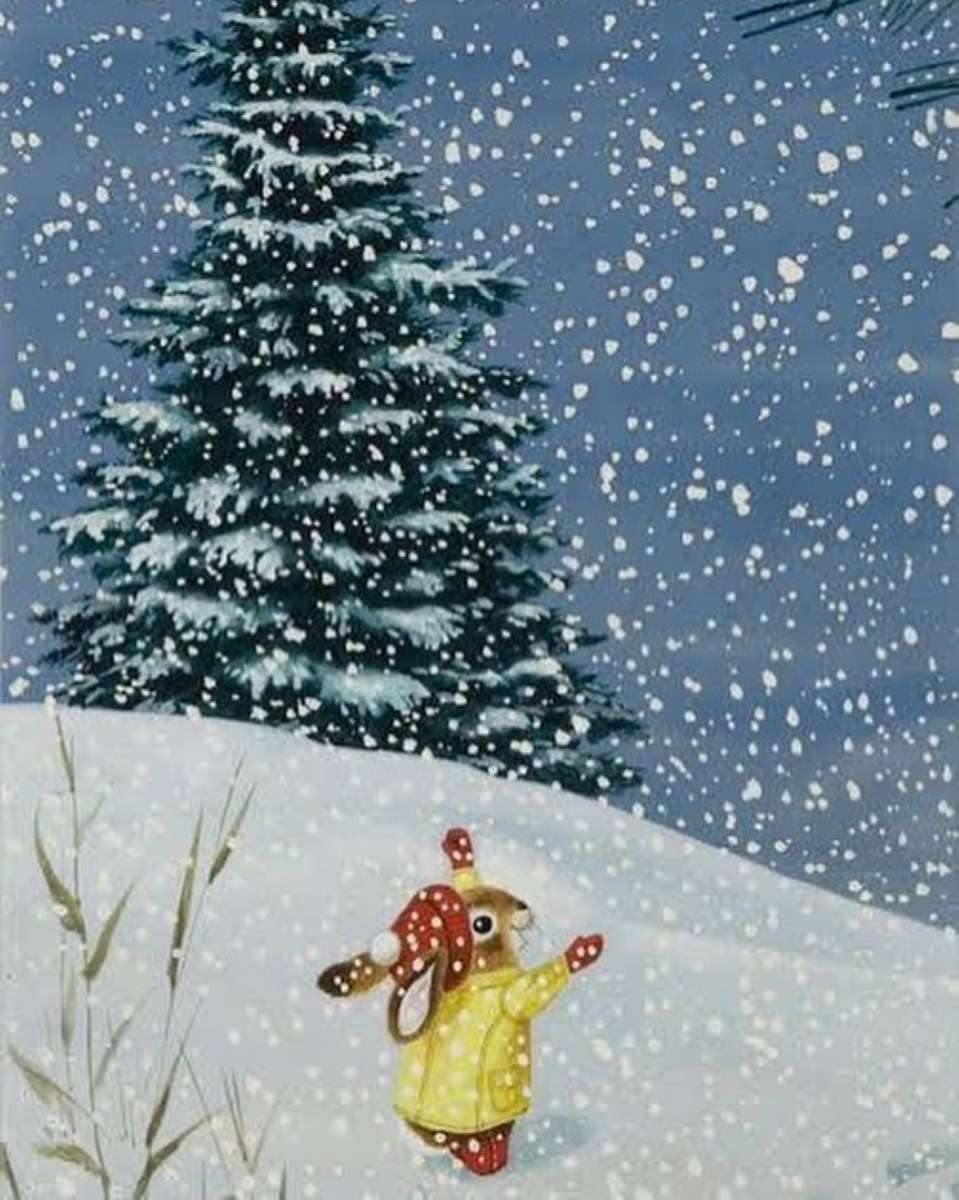 ένα χαρούμενο κουνέλι κάτω από το χιόνι παζλ online