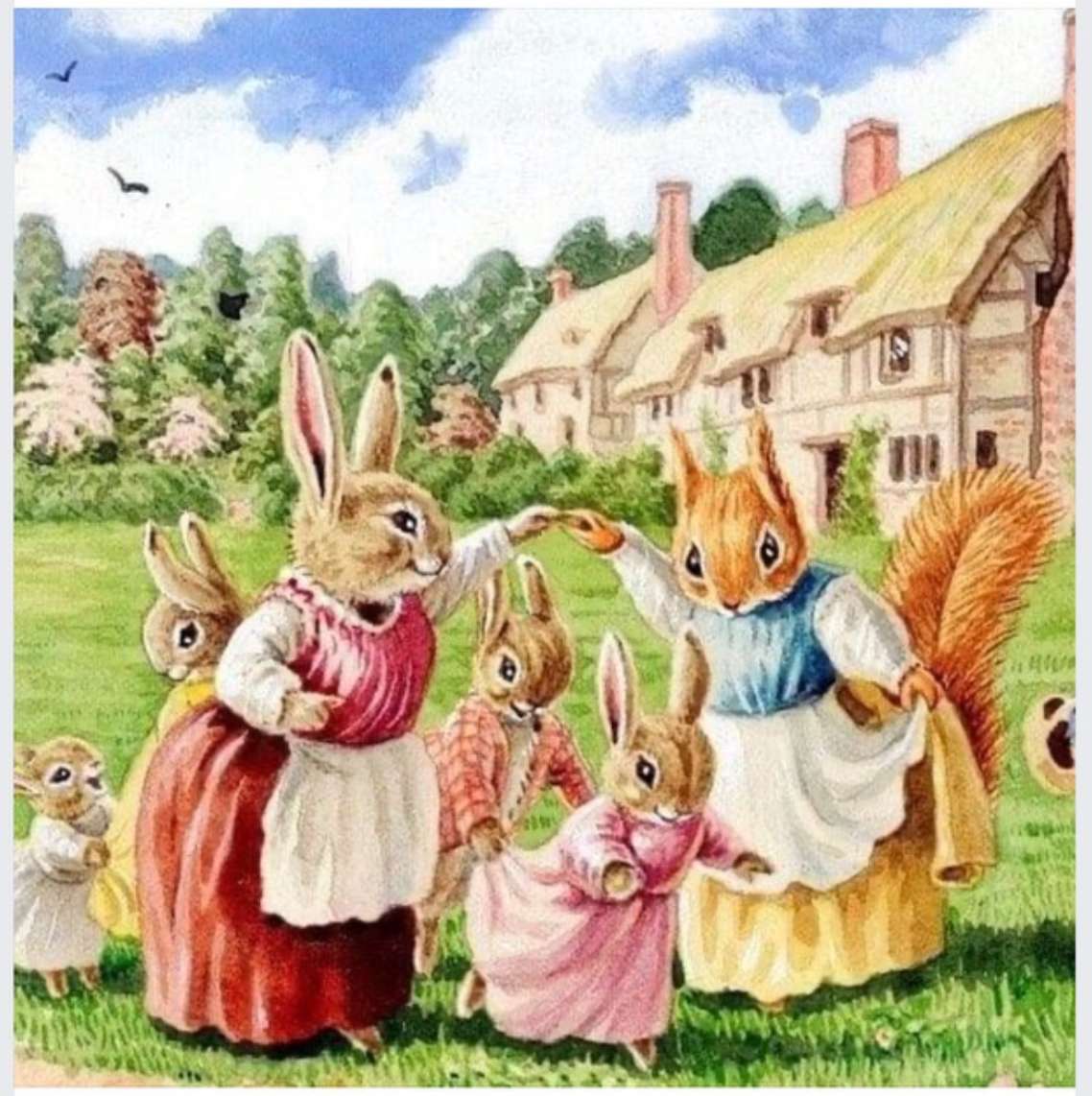 Kaniner som leker med sina kaniner. Pussel online