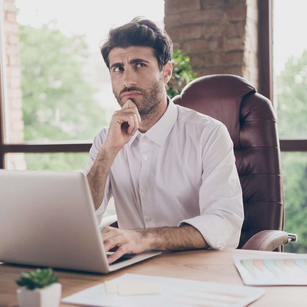 Man Thinking At A Laptop jigsaw puzzle online