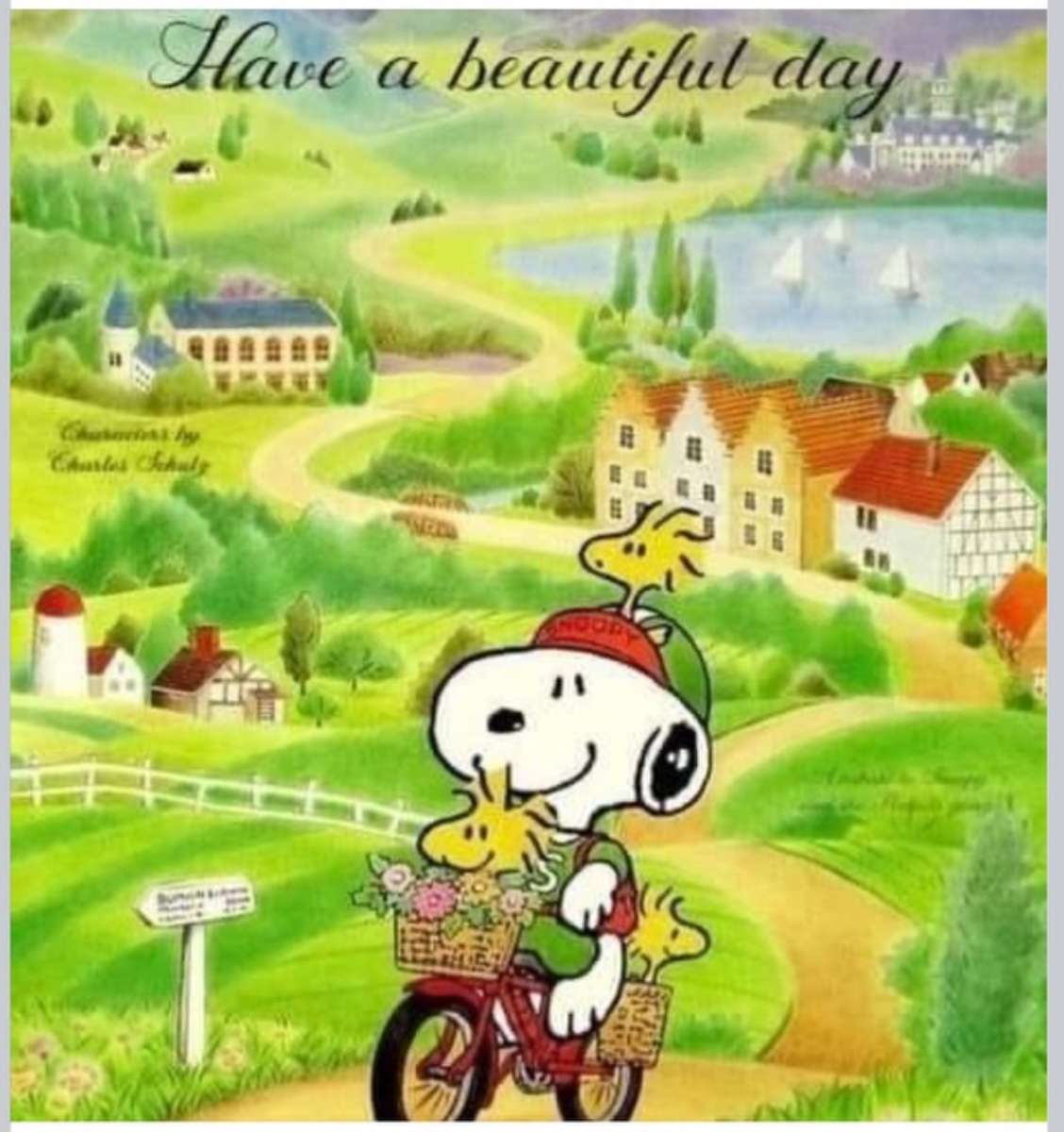 Snoopy et Woodstock font une balade à vélo. puzzle en ligne