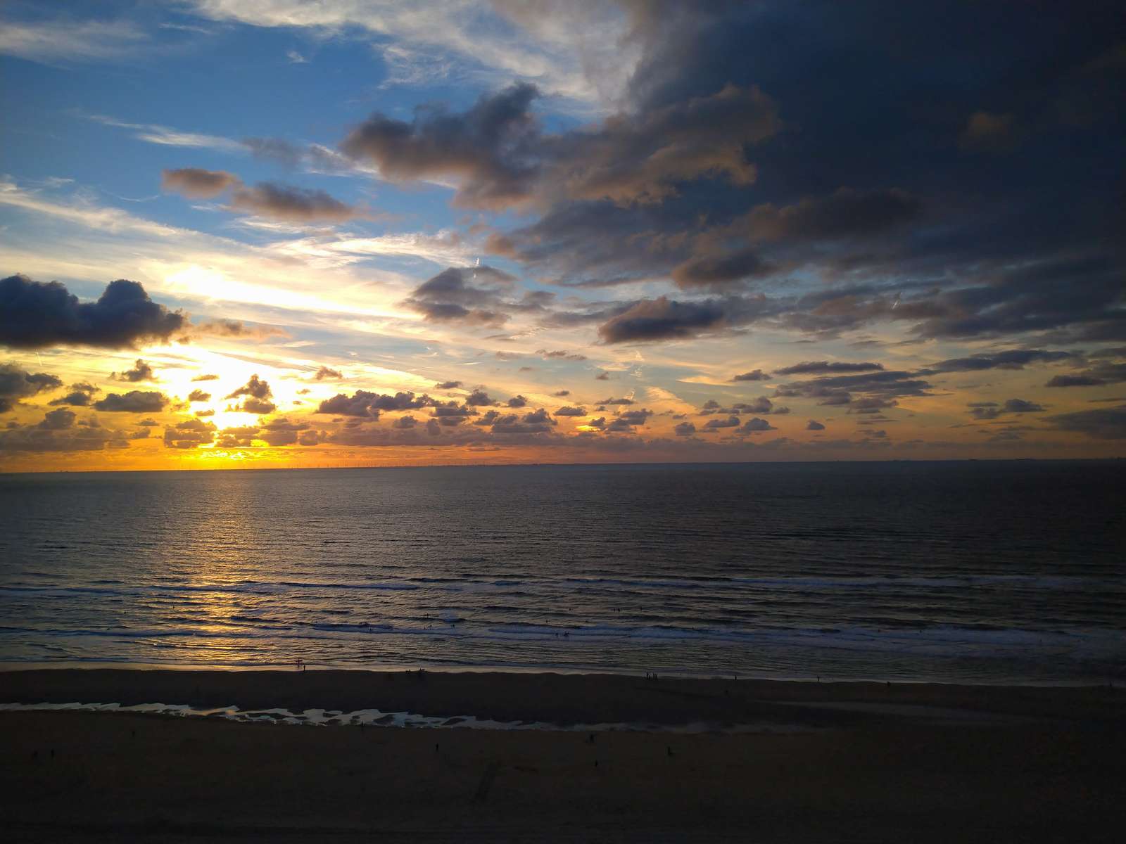 Pôr do sol no mar quebra-cabeças online