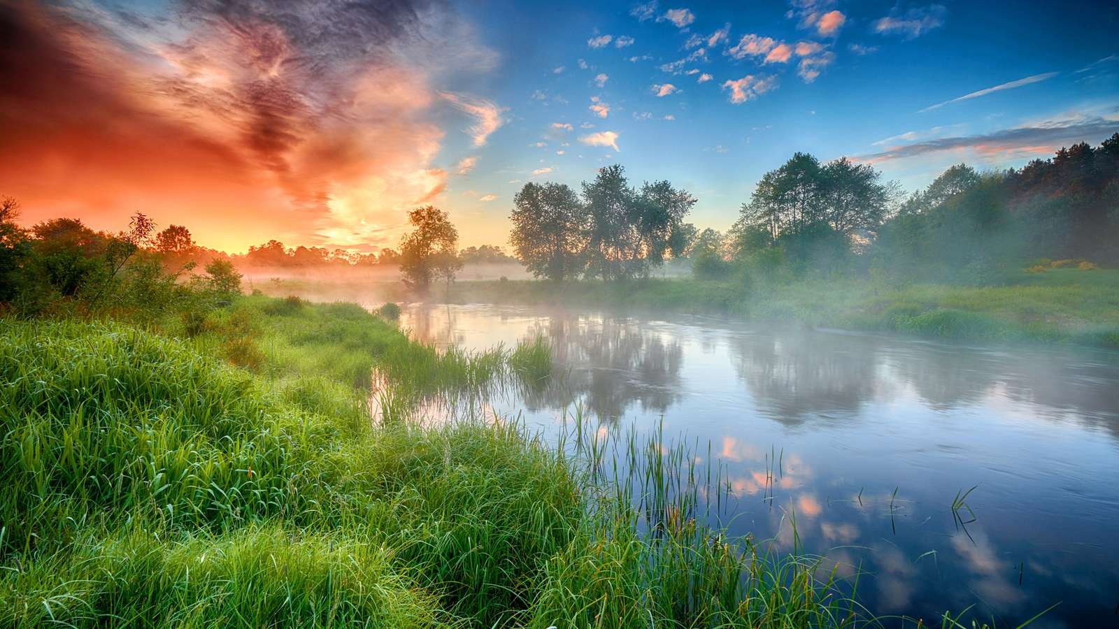 Sonnenuntergang am Fluss Online-Puzzle