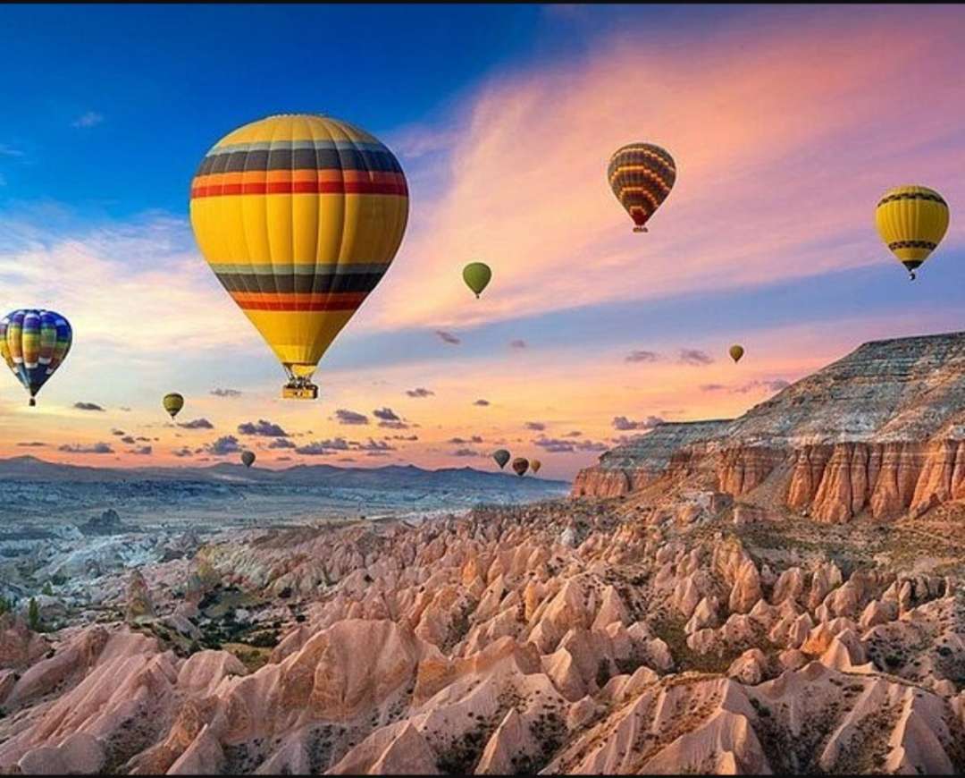 Air Balloons Floating Over Cappadocia jigsaw puzzle online