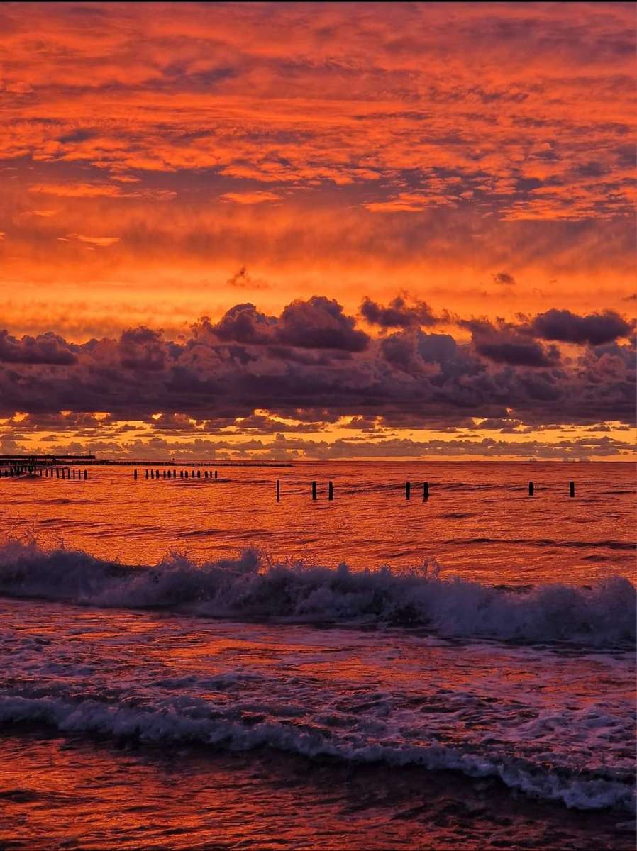 Sonnenuntergang über der Ostsee Puzzlespiel online